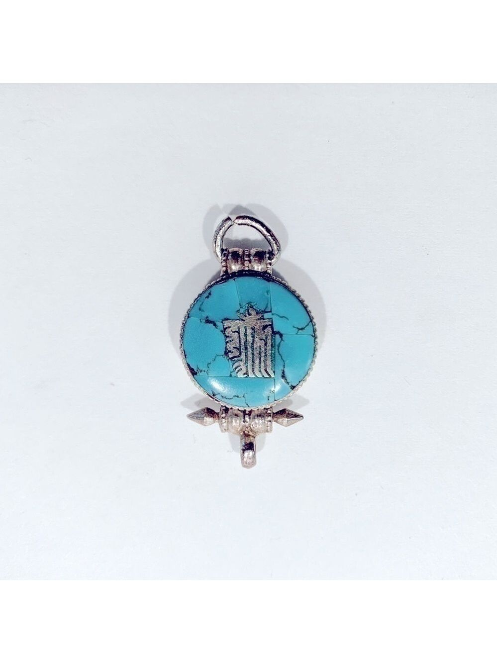 Stamped Silver Pendant With Turquoise Inlay.